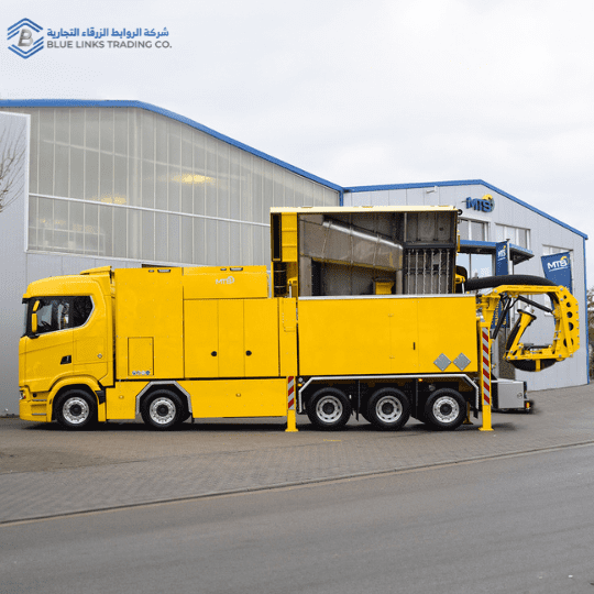 MTS Suction Excavator | Safe & Efficient Excavation Solution MTS yellow suction excavator with raised filtration container during maintenance – side full view.