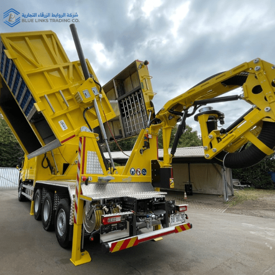 MTS Suction Excavator | Safe & Efficient Excavation Solution MTS yellow suction excavator with raised container and extended suction boom during dumping operation.