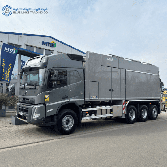 MTS Suction Excavator | Safe & Efficient Excavation Solution Grey Volvo-based MTS suction excavator parked outside the MTS factory, showing full side view of the unit.